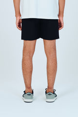 EMBLEM DRY STRETCH SHORT PANTS - BLACK