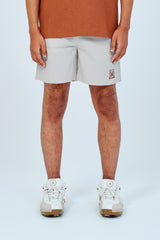 EMBLEM DRY STRETCH SHORT PANTS - CREAM