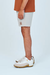 EMBLEM DRY STRETCH SHORT PANTS - CREAM