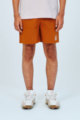EMBLEM DRY STRETCH SHORT PANTS - ORANGE