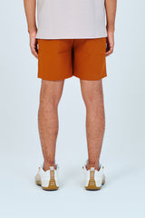 EMBLEM DRY STRETCH SHORT PANTS - ORANGE
