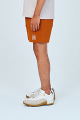 EMBLEM DRY STRETCH SHORT PANTS - ORANGE