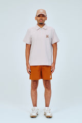 EMBLEM DRY STRETCH SS ZIP POLO SHIRT - CREAM