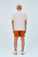 EMBLEM DRY STRETCH SS ZIP POLO SHIRT - CREAM