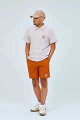 EMBLEM DRY STRETCH SS ZIP POLO SHIRT - CREAM