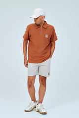 EMBLEM DRY STRETCH SS ZIP POLO SHIRT - ORANGE