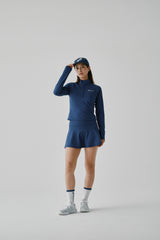 STRETCH FLARE SKIRT - NAVY (MODEL FRONT)