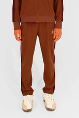 EMBLEM TRACK PANTS - BROWN