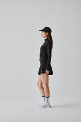 STRETCH FLARE SKIRT - BLACK (MODEL SIDE)